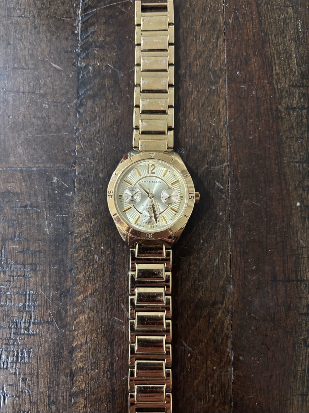 Anne Klein Gold Tone Bracelet Watch with Champagne Dial